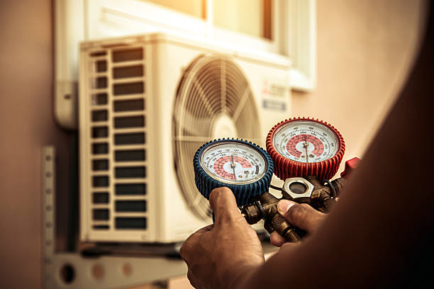 Professional Air Conditioning Service technician working in Saginaw, AL